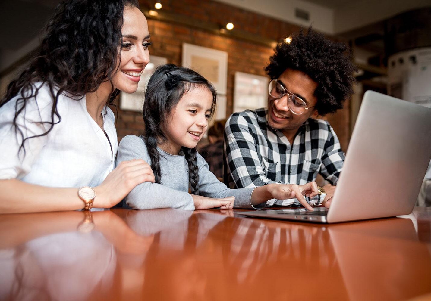 family working on laptop