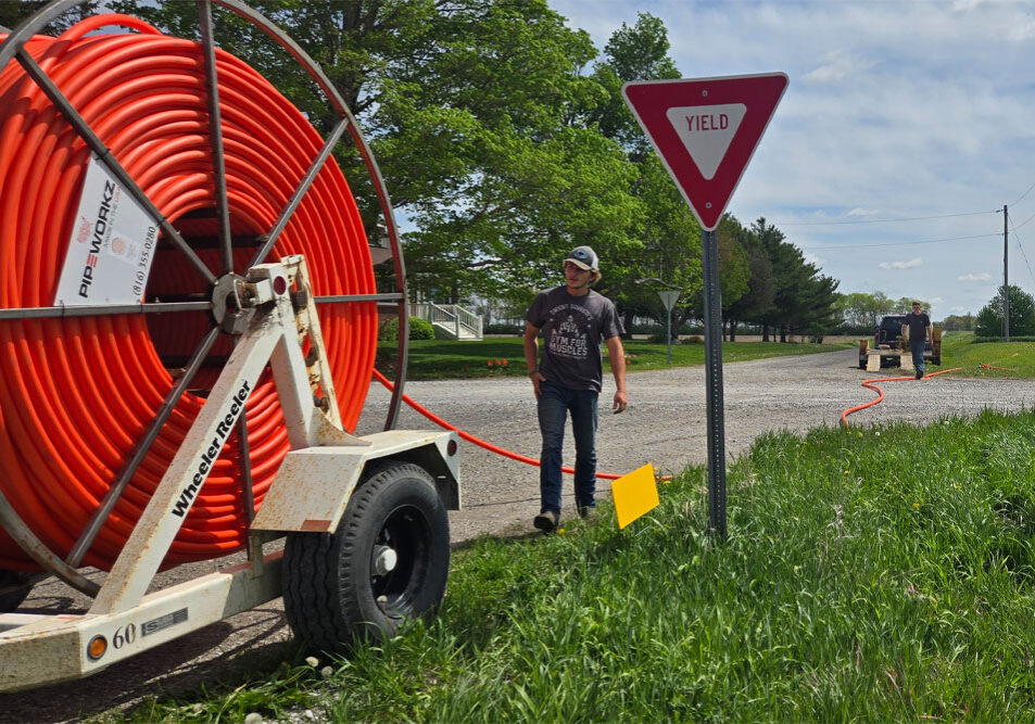 Pulling large fiber cable roll